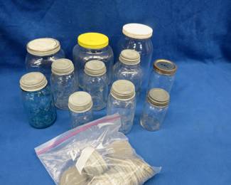 Lot 247. Vintage canning jars and other jars with extra zinc lids