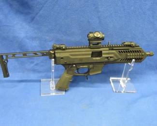 Lot 416. GForce Arms Blade8 S/N: TK245-25B05844, 9mm MP5-style pistol with original box, folding brace, one 30-round Glock magazine, and a Cyelee TT3 Red Dot sight. Permit Required