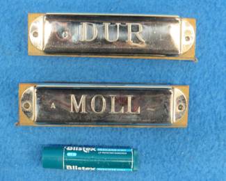 Lot 88. M. Hohner Dur and Moll (Major and Minor) 20-hole full concert harmonicas in the keys of C and A made to hinge together. Excellent condition. The box is in VGC. Minimum bid $100.