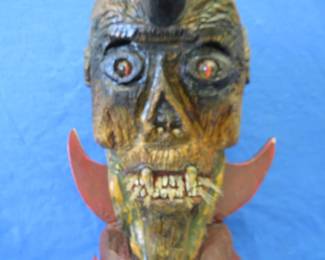 Lot 314. Handmade fantasy rotating horned creature with unknown electronic features. 28" tall.