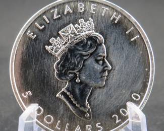 Lot 378. 2000 $5.00 Canadian Maple Leaf. One troy ounce of .999 fine silver.