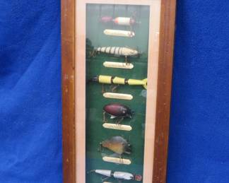 Lot 459. Six replica lures from the early 20th Century in a framed display, 21" x 9 3/4" x 1 1/2"