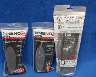 Lot 256. Three 5.56 / .223 magazines; One 60-round and two 30-round