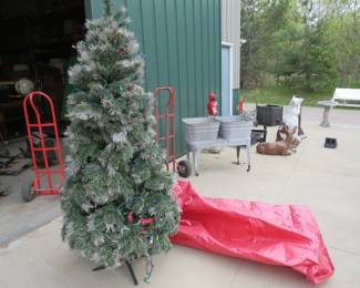 Lot 148. Frosted Christmas tree with attached lights and a storage bag