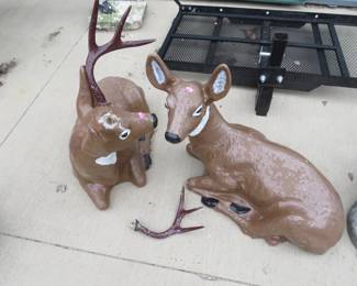 Lot 137. Small concrete whitetail buck and doe. One antler needs regluing