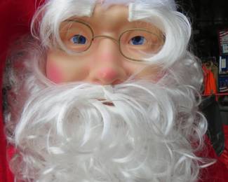 Lot 162. Full-size electric dancing Santa and storage bag. Sings in English or Spanish.