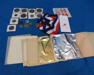 Lot 200. Tokens, gold leaf, and 2.26 grams of teeth with gold