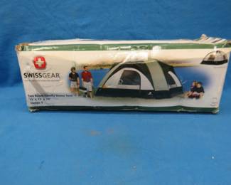 Lot 119. Swissgear two-room tent. Sellers states it is new in the box.