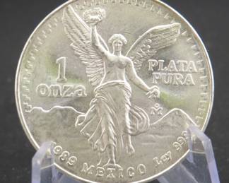 Lot 267. 1989 Mexican pure silver round. 31.05 grams.