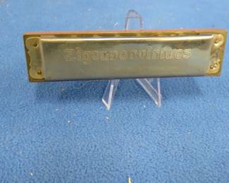 Lot 352. Hohner Zigeunervirtuos 56-hole octave harmonica in the key of C. Sounds great.
