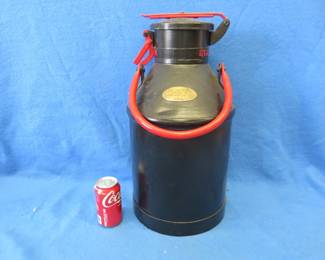 Lot 345. Vintage 5 gallon Standard Oil metal container with locking lid. Has been repainted.