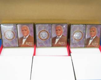 Lot 464. Approx. 72 gift boxes of NIP playing cards advertising for Brown & Bigelow, each containing two decks of cards