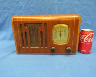 Lot 398. Two old tube radios. A Philco in a wood case and a Trav-Ler portable. Both untested.