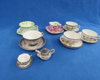 Lot 216. Vintage china coffee cups and saucers