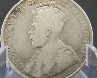 Lot 385. 1916 Canadian half dollar. 92.5% silver.