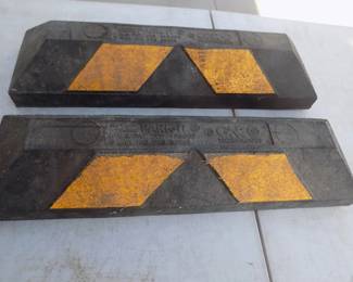 Lot 304. Two hard rubber "Parkit" curbs