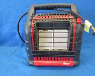 Lot 325. Mr. Heater propane heater. Can use either 1 lb. or 20 lb. tank with a hose