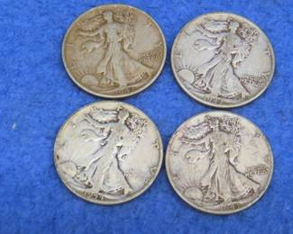 Lot 192. Four Walking Liberty half dollar coins: 1943P (3), and 1944S