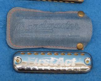 Lot 80. Three harmonicas: The Bandmaster diatonic harmonica in the key of C made in the German Democratic Republic. Unknown maker First Act harmonica. Sounds great. Unknown maker The Gladiator 10-hole diatonic harmonica with poor sound.
