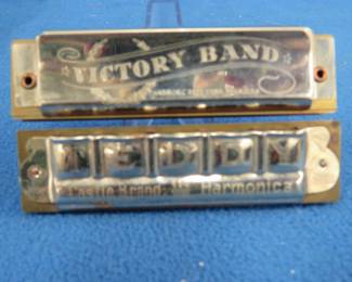 Lot 351. Castle Brand " Teddy" 10-hole diatonic harmonica. Harmonic Reed Company "Victory Band" 10-hole diatonic harmonica. Sounds great.