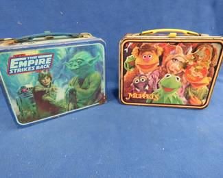 Lot 240. Two metal lunchboxes. 1979 Kermit the Frog in good condition, and a 1980 Star Wars for parts or repair.