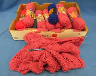 Lot 399. Skeins of yarn and an unfinished winter project