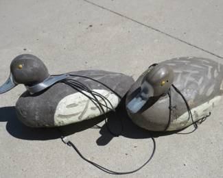 Lot 368. Four vintage bluebill decoys. Three are burlap-wrapped foam and one is cork.