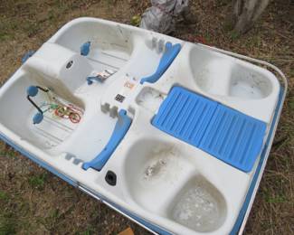 Lot 169. Four-person Pelican Voyage DLX RamX Ultradurable paddle boat. Approx. 8 1/2' long. No license required.