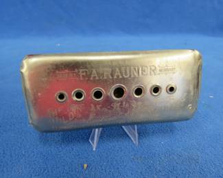 Lot 288. F. A. Rauner The Wild West 64-hole double-sided harmonica in the keys of G and C with fair sound