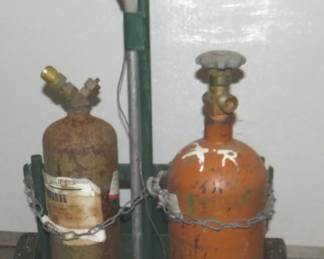 Lot 433. Small Oxygen / Acetylene tanks with wrench and portable cart