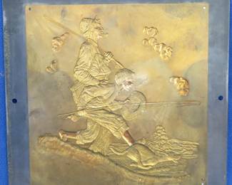 Lot 319. Vintage Norman Rockwell "Gone Fishing" brass embossed plate. 10 3/8" x 10 3/4" and 1/4" attached to an aluminum sheet approximately 13" x 13". Copyright unknown. Adhesive residue on the boy.