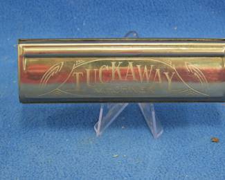 Lot 289. M. Hohner Tuckaway 32-hole tremolo harmonica in the key of G. Tuckaway feature works fine. Sounds great