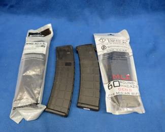 Lot 254. Four 5.56 / .223 magazines; one 60-round and three 40-round