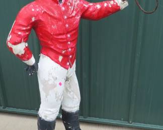 Lot 139. 44-inch tall concrete jockey. See photos for condition