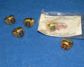 Lot 402. Five replica Minnesota Twins World Championship rings. Four 1987 and one 1991.