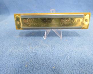 Lot 350. Unknown Polish maker Melody Master 56-hole octave harmonica. Sounds great.