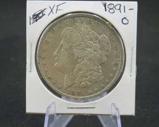 Lot 27. 1891 O Morgan silver dollar