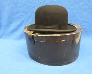 Lot 397. Bowler style vintage hat in a non-matching box. Size estimate small-med.