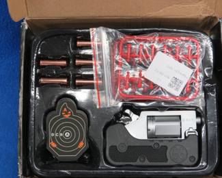 Lot 201. Guagua Toys switch gun "22 Mag." Includes small targets and "darts"