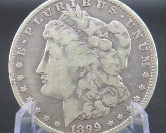 Lot 31. 1899 O Morgan silver dollar