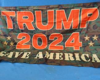 Lot 326. Two Trump flags and a Trump bumper sticker