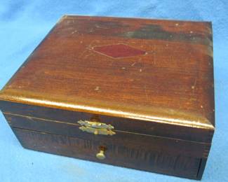 Lot 89. Wooden harmonica storage box that may be from Hohner