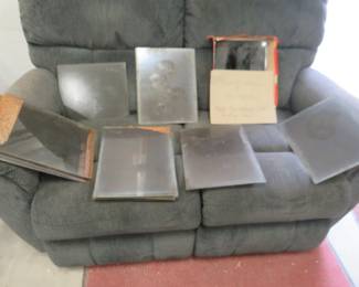 Lot 426. Antique glass plates negatives. Sixteen 14" x 11". Five 12" x 10" and some backing plates. No shipping on this item.