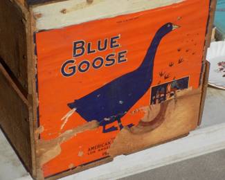 Lot 297. Blue Goose crates, old books, and more