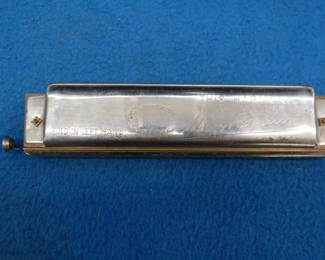 Lot 87. M. Hohner 16-hole chromatic harmonica in the key of C. "Recommended by Hugo Rauner".