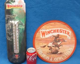 Lot 401. Winchester sign and thermometer