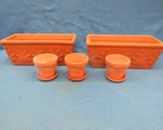 Lot 248. Two planters made in Italy and three flower pots not made in Italy
