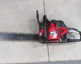Lot 427. Craftsman 18" chainsaw with a 42cc engine that has compression, includes a carry case