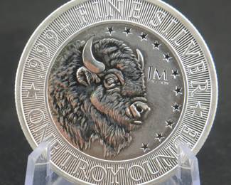 Lot 12. JM Bullion silver round. One troy ounce (31.21 grams) of .999 fine silver