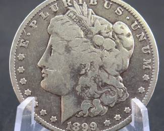 Lot 26. 1899 O Morgan silver dollar
